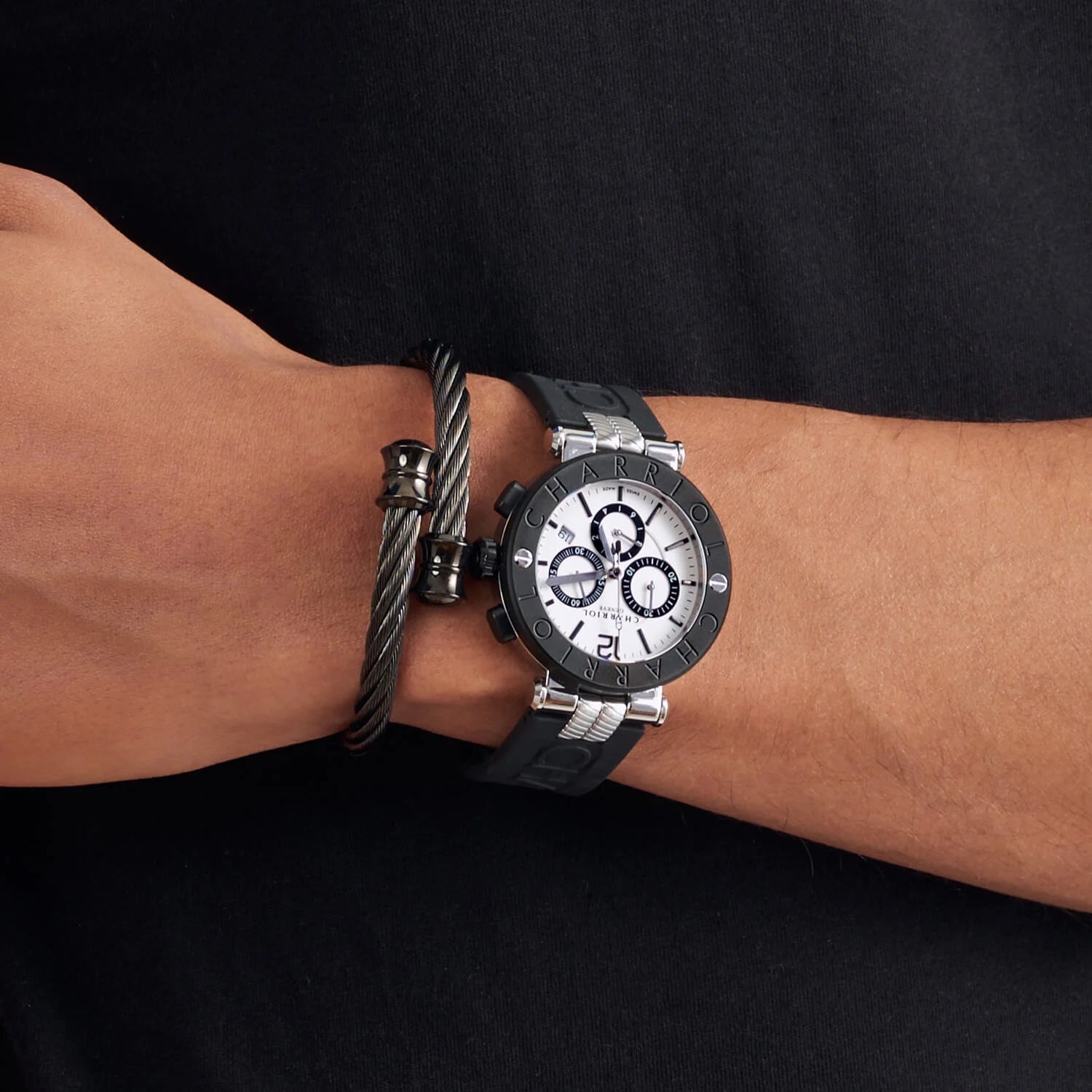 NAVIGATOR CRUISE, 41MM, QUARTZ CHRONOGRAPH CALIBRE, WHITE DIAL WITH 1 ARABIC AND 11 RHODIUM INDEX DIAL, STEEL BLACK PVD "CHARRIOL CHARRIOL" BEZEL, BLACK RUBBER INTERCHANGEABLE BRACELET - ©2025 Philippe Charriol International Ltd. - Watch